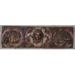 A Victorian carved oak wall plaque, 99 x 30cm