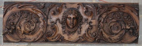 A Victorian carved oak wall plaque, 99 x 30cm