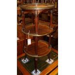 A late 19th century French circular mahogany and brass three tier etagere, 36cm diameter, H.76cm