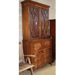 A Sheraton style mahogany secretaire bookcase, W.100cm, D.46cm, H.220cm