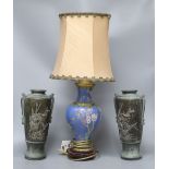 A pair of Chinese bronze iris decorated vases, height 28cm and a cloisonne lamp