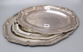 Three plated serving dishes, shaped and gadroon-bordered, widest 51cm