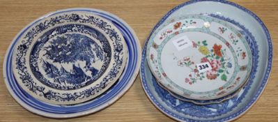 An early 19th century Chinese floral plate, a Chinese blue and white plate and meat platter,