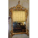 A giltwood and gesso wall mirror, W.58cm, H.110cm