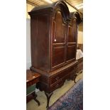 An early 18th century Dutch inlaid oak double dome top cabinet on stand, W.134cm, D.60cm, H.212cm