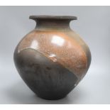 A Raku glazed studio pottery jug by Tim Andrews, height 34cm