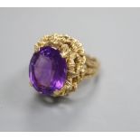 A 9ct gold faceted amethyst dress ring, finger size N/O