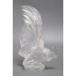 A Lalique glass 'cockerel' car mascot, height 21cmCONDITION: It has a large chip to the tip of its
