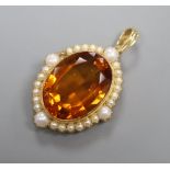 A citrine and seed pearl pendant, stamped '15ct', 3.5cm excluding '14k' suspension loop,