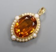 A citrine and seed pearl pendant, stamped '15ct', 3.5cm excluding '14k' suspension loop,