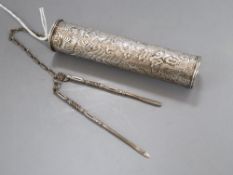 An early 20th century Middle Eastern repousse white metal incense holder? 11.2cm, with two