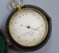 A Negretti and Zambra gilt metal cased pocket barometer