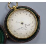 A Negretti and Zambra gilt metal cased pocket barometer