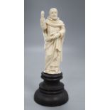 An ivory depiction of the Pope on wooden base, height 17cm