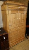 A 19th century Continental pine hanging cupboard with dummy drawer cupboard front, W.98cm, D.53cm,