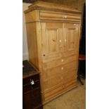 A 19th century Continental pine hanging cupboard with dummy drawer cupboard front, W.98cm, D.53cm,