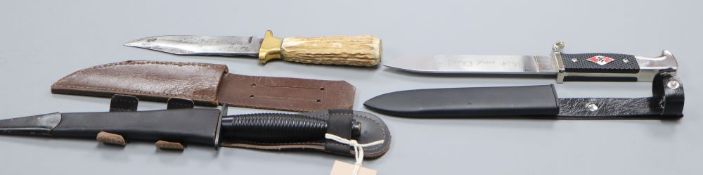 A Fairbairn and Sykes third pattern commando knife, an antler handled knife, blade inscribed '