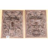A pair of carved wall lion masks, width 23cm height 28cm