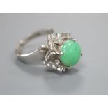 A diamond and jadeite dress ring, finger size L