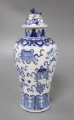 A Chinese blue and white Buddhist Emblem's vase and cover, Kangxi mark but c. 1900, overall height