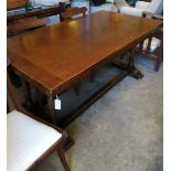 A 1920's oak draw leaf dining table, W.167cm, D.91cm, H.76cm