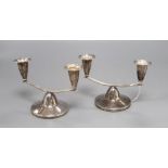 A pair of silver twin branch dwarf candelabra, Adie Bros. Ltd, 1960, loaded, 10.5cm high