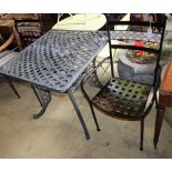 A square lattice metal garden table, W.83cm, H.76cm and two chairs