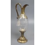 A Victorian silver gilt and engraved glass claret jug, maker's mark CF, Sheffield 1876, 35.5.