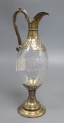 A Victorian silver gilt and engraved glass claret jug, maker's mark CF, Sheffield 1876, 35.5.