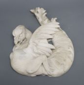 A carved white marble griffin, overall length 36cm (a.f.)