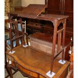 An Edwardian oak adjustable reading table, W.94cm, D.34cm, H.70cm