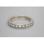 A diamond and white metal full eternity ring, finger size M