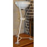 A painted wrought iron wash stand, H.84cm