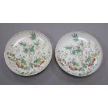 A pair of Chinese famille rose 'fruit and bamboo' saucer dishes, diameter 13cm