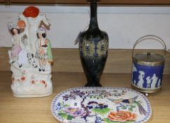 A Stone China drainer, a Staffordshire Highlander group, a Royal Doulton vase and a Wedgwood biscuit