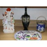 A Stone China drainer, a Staffordshire Highlander group, a Royal Doulton vase and a Wedgwood biscuit