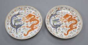 A pair of Chinese enamelled porcelain 'dragon' saucer dishes, diameter 13cm