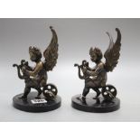 A pair of 19th century bronze cherub bookends, height 16cm