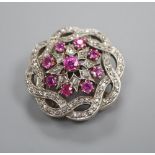 A Victorian/Edwardian ruby and diamond brooch with later pendant fittingCONDITION: All stones