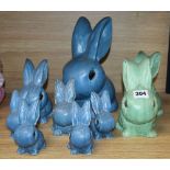 Seven blue Sylvac rabbits and two green rabbits, tallest 25cm