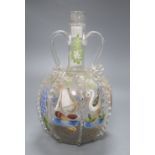 A Belgian enamel painted glass decanter, height 25cmCONDITION: Wear to the paint in several areas, a