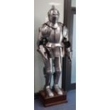 A reproduction suit of armour, height 180cm