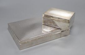 A rhodium plated white metal cigar box, marked 'STERLING 925' and a silver cigarette box, London