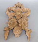 A carved beech ribbon and fruit wall applique, length 47cm