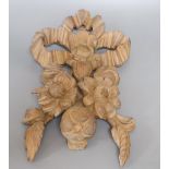 A carved beech ribbon and fruit wall applique, length 47cm