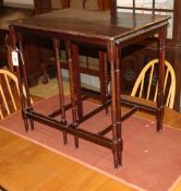 An Edwardian nest of three rectangular mahogany tea tables, W.66cm, D.47cm, H.62cm