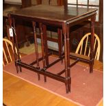 An Edwardian nest of three rectangular mahogany tea tables, W.66cm, D.47cm, H.62cm