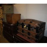 An early 20th century metal bound domed topped steamer trunk, W.76cm, a leather bound trunk and