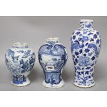 A 19th century Chinese blue and white vase, height 27cm (a.f.) and two prunus jars