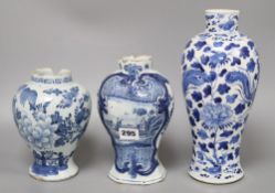 A 19th century Chinese blue and white vase, height 27cm (a.f.) and two prunus jars